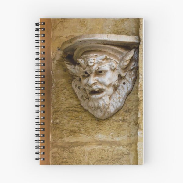 Item preview, Weathered Stone Gargoyle Sculpture Corbel Detail On Historic Building Façade Close-Up designed and sold by Nmallia.
