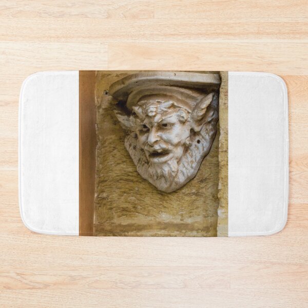 Item preview, Weathered Stone Gargoyle Sculpture Corbel Detail On Historic Building Façade Close-Up designed and sold by Nmallia.