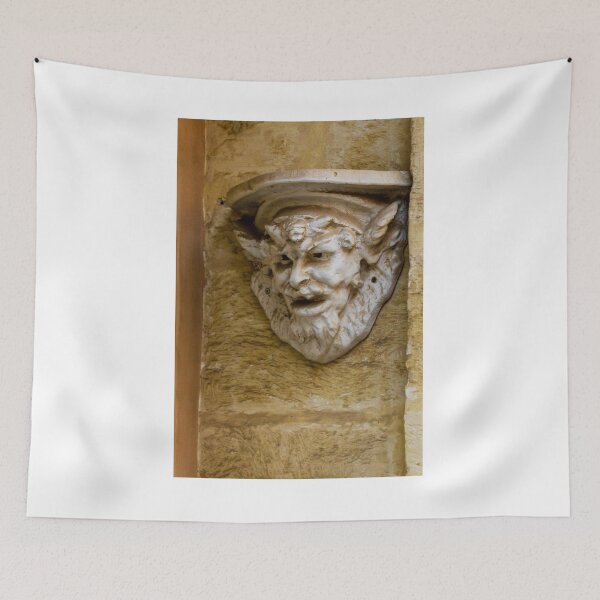 Item preview, Weathered Stone Gargoyle Sculpture Corbel Detail On Historic Building Façade Close-Up designed and sold by Nmallia.