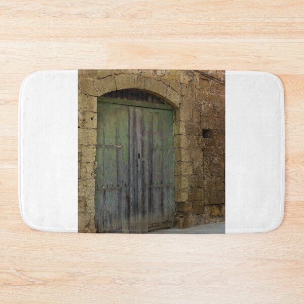 Item preview, Weathered Green Wooden Door in Stone Archway of Rustic Old Building Entrance designed and sold by Nmallia.