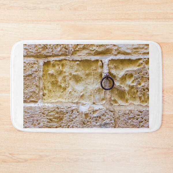 Item preview, Rusty Iron Ring on Weathered Limestone Wall With Historic Stone Texture and Patina designed and sold by Nmallia.