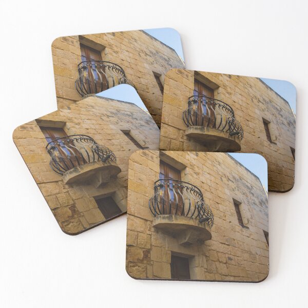 Item preview, Old Stone Building With Wrought Iron Balcony And Wooden Window On Sunny Day designed and sold by Nmallia.