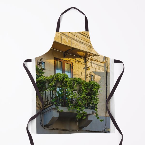 Item preview, Sunlit Balcony With Lush Green Vines Draping Over Iron Railing And Wooden Doors designed and sold by Nmallia.