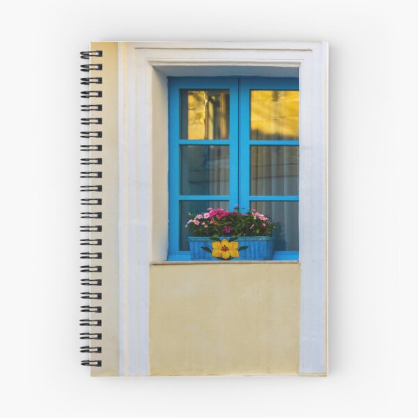 Item preview, Blue Window With Flower Box On Yellow Mediterranean Facade At Sunset Reflection designed and sold by Nmallia.