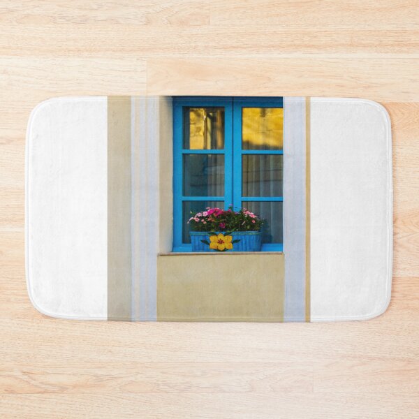 Item preview, Blue Window With Flower Box On Yellow Mediterranean Facade At Sunset Reflection designed and sold by Nmallia.