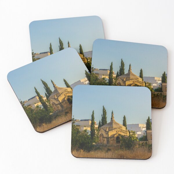 Item preview, Historic Stone Mausoleum Chapel With Cross Among Cypress Trees Overlooking Urban Landscape At Golden Hour designed and sold by Nmallia.