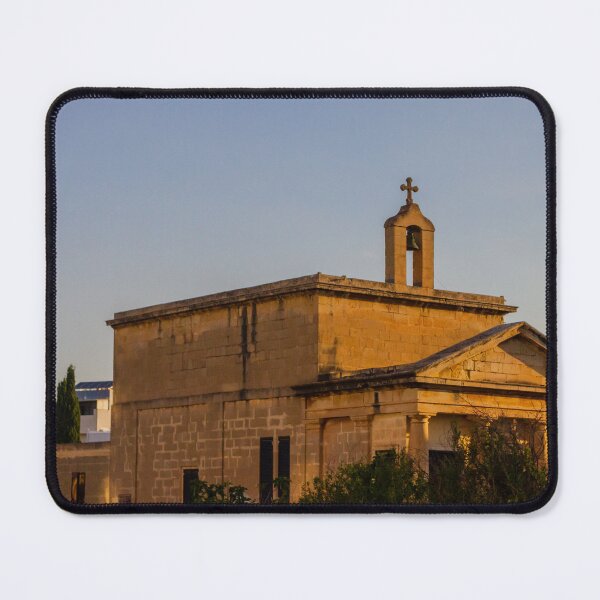 Item preview, Sunlit Stone Chapel With Bell Tower and Cross at Sunset in a Mediterranean Town designed and sold by Nmallia.