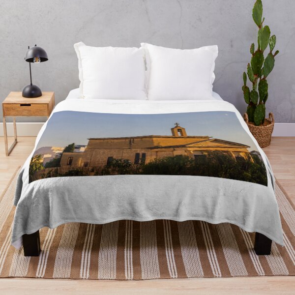 Item preview, Sunlit Stone Chapel With Bell Tower and Cross at Sunset in a Mediterranean Town designed and sold by Nmallia.