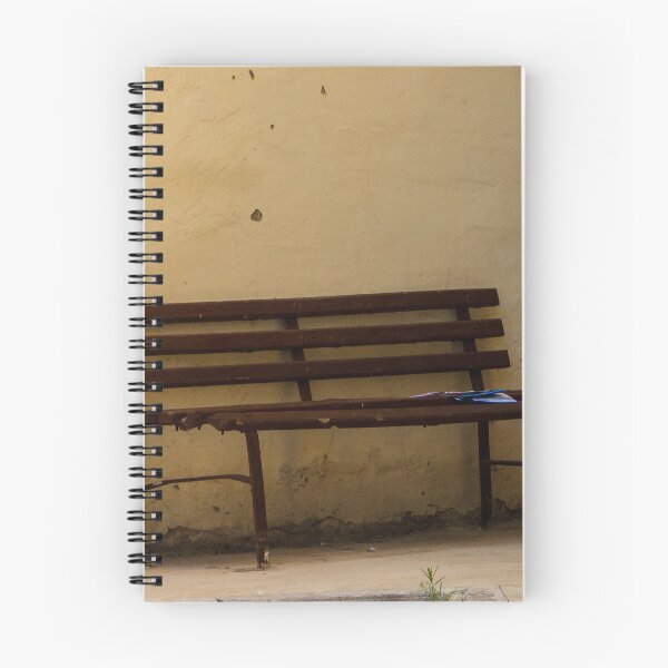 Item preview, Empty Rustic Bench Against a Weathered Wall in a Quiet Urban Corner designed and sold by Nmallia.
