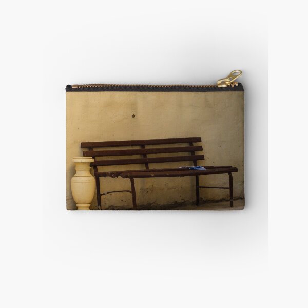 Item preview, Empty Rustic Bench Against a Weathered Wall in a Quiet Urban Corner designed and sold by Nmallia.