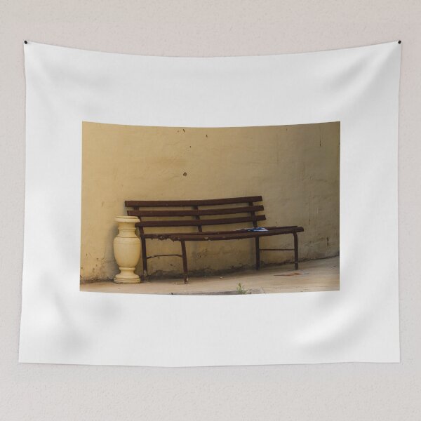 Item preview, Empty Rustic Bench Against a Weathered Wall in a Quiet Urban Corner designed and sold by Nmallia.