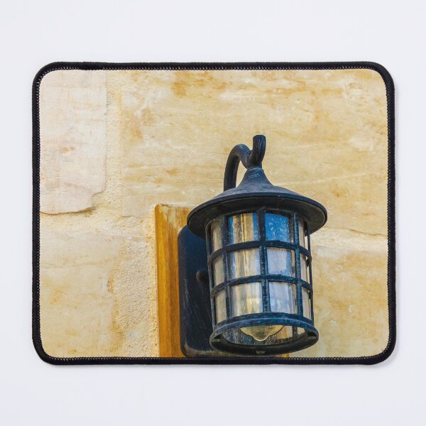 Item preview, Vintage Wall Lantern With Bulb and Rusted Metal Fixture Against Beige Tiled Wall designed and sold by Nmallia.
