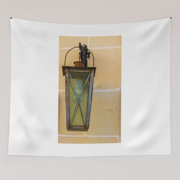Item preview, Vintage Wall Lantern With Bulb and Rusted Metal Fixture Against Beige Tiled Wall designed and sold by Nmallia.