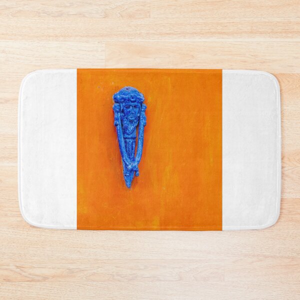 Item preview, Blue Decorative Door Knocker On Bright Orange Painted Door With Rustic Texture And Contrast designed and sold by Nmallia.
