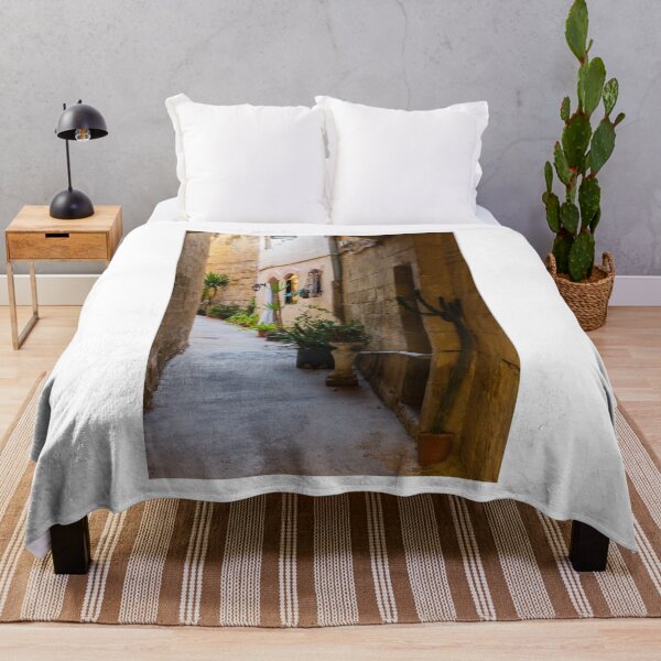 Item preview, Charming Sunlit Narrow Mediterranean Alleyway With Potted Plants, Stone Walls and Arched Doorways designed and sold by Nmallia.