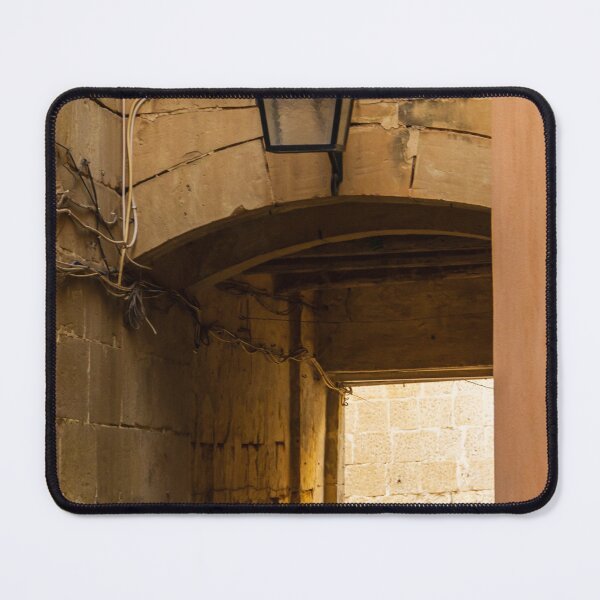Item preview, Old Stone Alley Lantern Over Arched Passageway With Weathered Walls And Warm Light designed and sold by Nmallia.