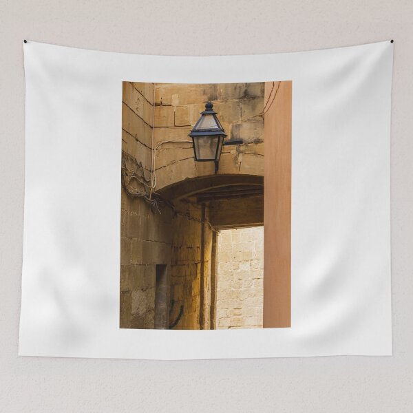 Item preview, Old Stone Alley Lantern Over Arched Passageway With Weathered Walls And Warm Light designed and sold by Nmallia.