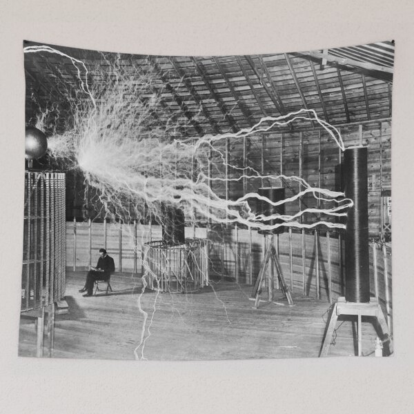 Item preview, Nikola Tesla in the eye of the storm with his Magnifying Transmitter and coils 1899 black and white vintage photograph designed and sold by Astrid Arkhangelsky.