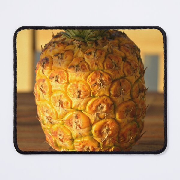 Item preview, Golden Ripe Pineapple on Wooden Outdoor Table designed and sold by MiraNadaPrints.