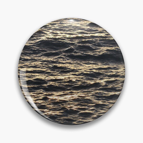 Item preview, Sunlit Ocean Ripples Glowing at Golden Hour designed and sold by MiraNadaPrints.