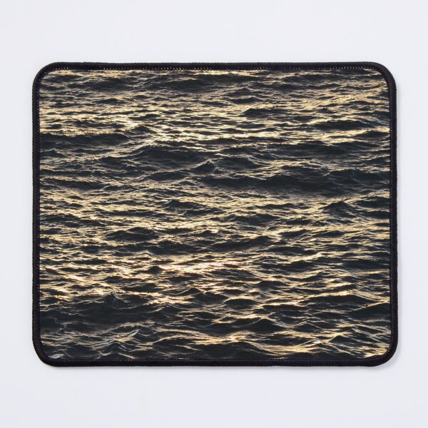 Item preview, Sunlit Ocean Ripples Glowing at Golden Hour designed and sold by MiraNadaPrints.