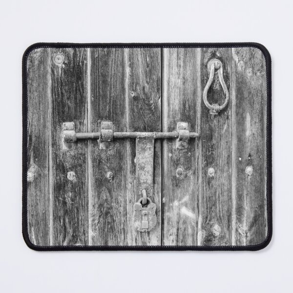 Item preview, Black and White View of an Aged Wooden Door With Metal Lock designed and sold by Nmallia.