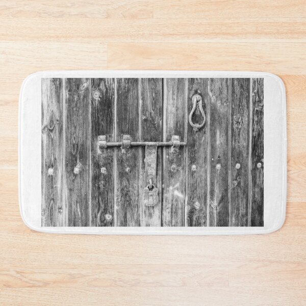 Item preview, Black and White View of an Aged Wooden Door With Metal Lock designed and sold by Nmallia.