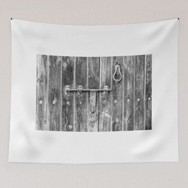 Item preview, Black and White View of an Aged Wooden Door With Metal Lock designed and sold by Nmallia.