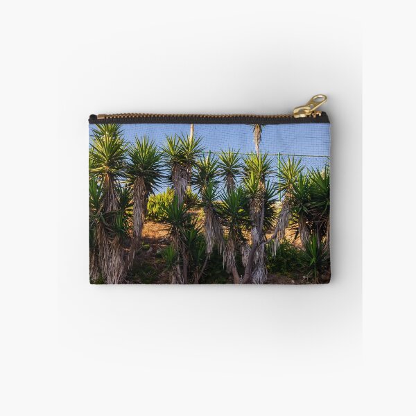 Item preview, Tropical Yucca Plants Growing Along a Hillside Under a Clear Blue Sky designed and sold by Nmallia.