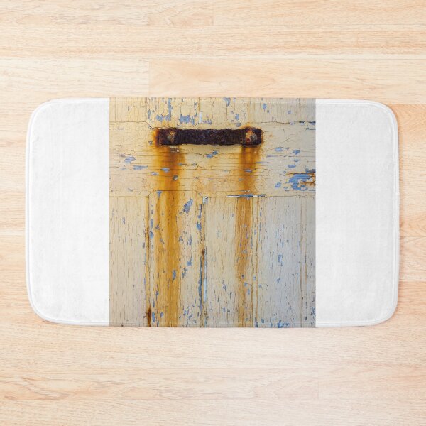 Item preview, Rusty Metal Handle on Weathered Wooden Door with Peeling Yellow Paint designed and sold by Nmallia.