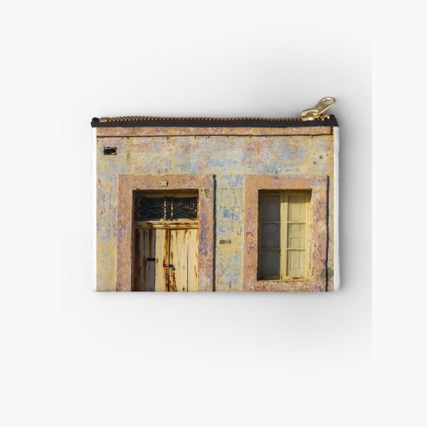 Item preview, Vintage Stone Building with Worn Doors and Windows in Bright Sunlight designed and sold by Nmallia.
