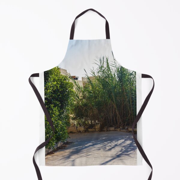 Item preview, Serene Outdoor Scene with Green Foliage and Shadows on Concrete Pathway designed and sold by Nmallia.