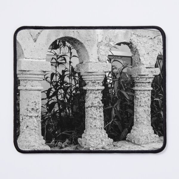 Item preview, Black and White Arched Columns of a Rustic Stone Structure With Leafy Background designed and sold by Nmallia.