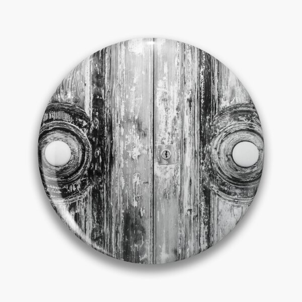 Item preview, Closeup of Weathered Wooden Doors in a Black and White Composition designed and sold by Nmallia.