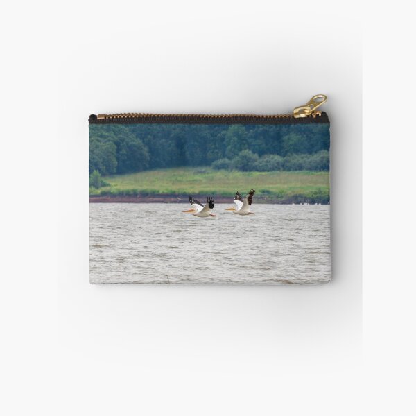 Item preview, Two Pelicans Flying in Sync across Wind Swept Water.  designed and sold by South 500 Photography.