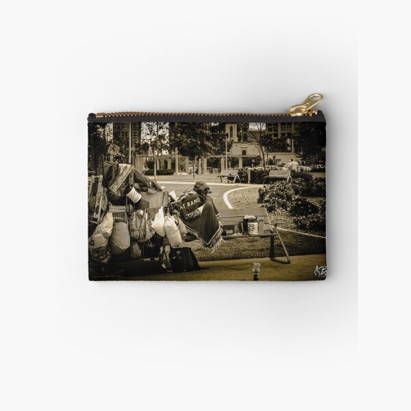 Item preview, A person with their personal belongings in an urban park designed and sold by By Sanata Photography.
