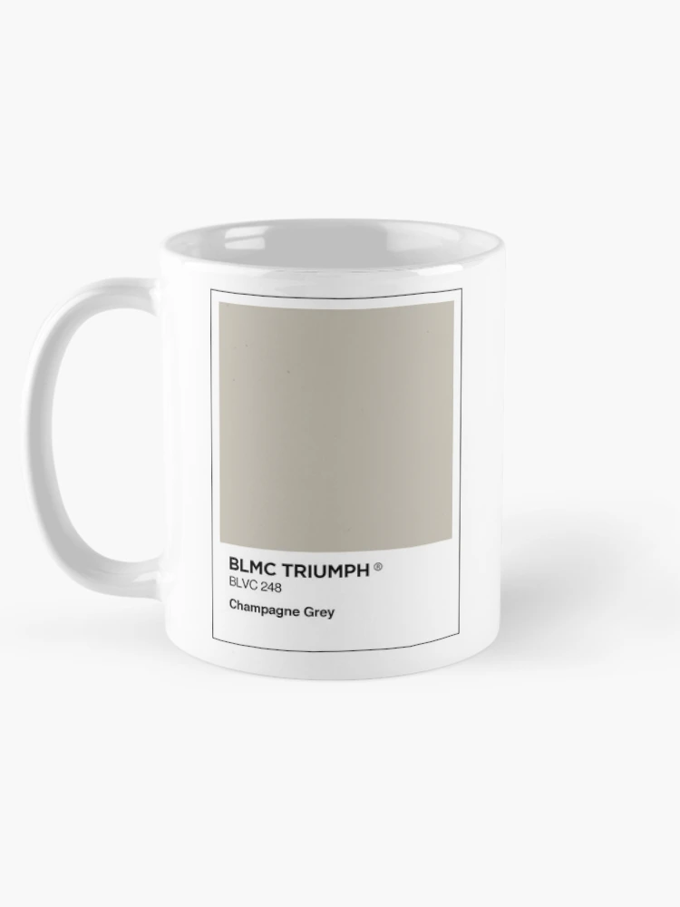 Aperçu 5 sur 6. Mug à café avec l'œuvre BL Triumph Champagne grey colour swatch Mug & Sticker créée et vendue par RJWautographics Mugs and Stickers.