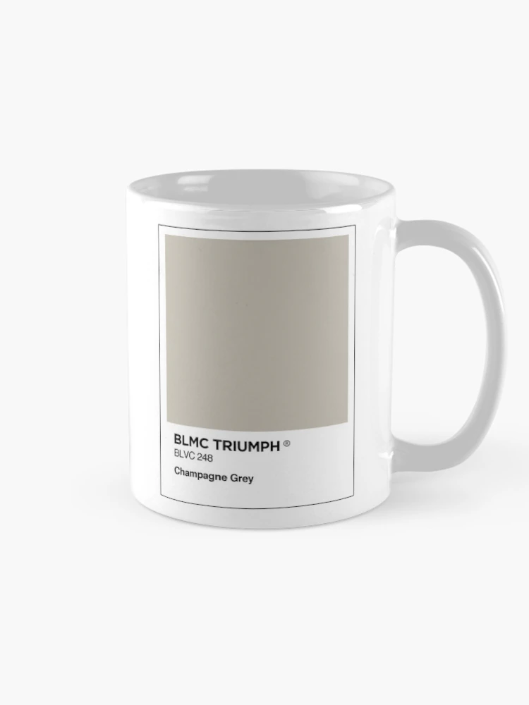 Aperçu 3 sur 6. Mug à café avec l'œuvre BL Triumph Champagne grey colour swatch Mug & Sticker créée et vendue par RJWautographics Mugs and Stickers.