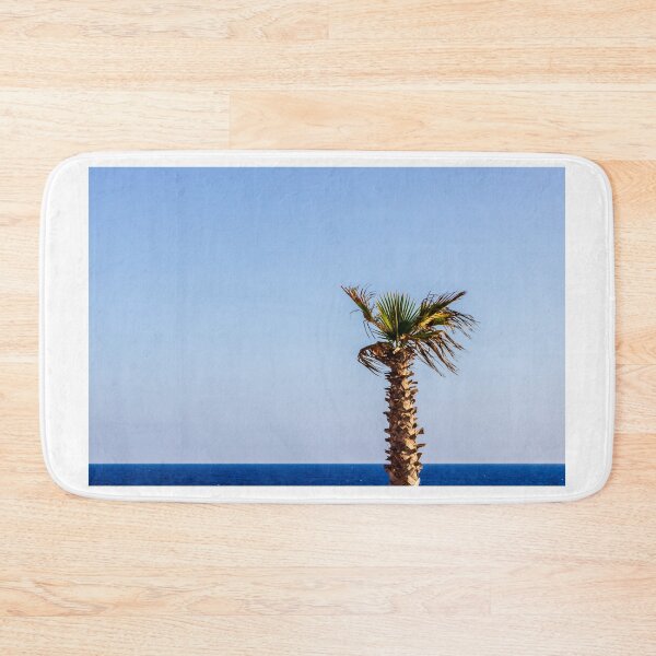 Item preview, Beautiful Palm Tree by the Ocean Under a Clear Blue Sky designed and sold by Nmallia.