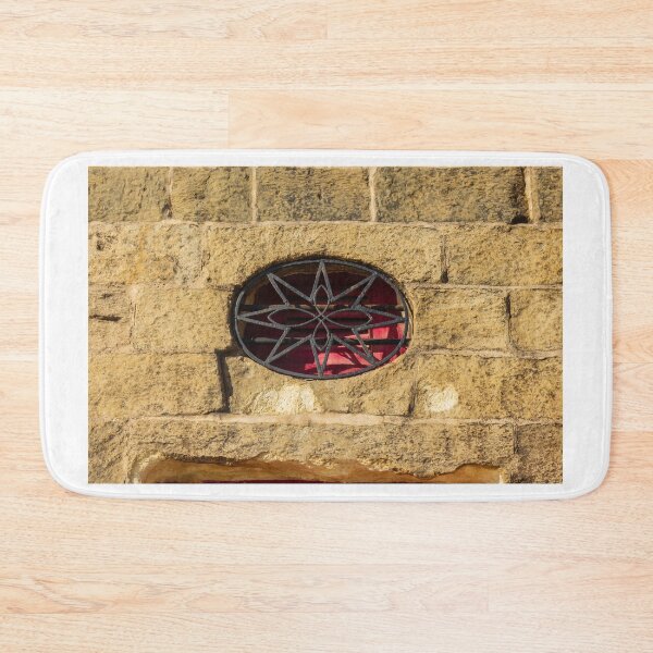 Item preview, Oval Metal Window Grate on a Stone Wall with Red Background designed and sold by Nmallia.