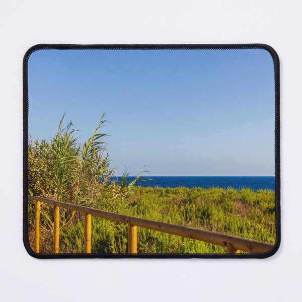 Item preview, Scenic Coastal Pathway Overlooking Lush Greenery and the Clear Blue Ocean designed and sold by Nmallia.