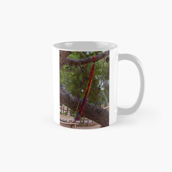 Item preview, Colorful Ribbons Hanging on Tree Branch in Serene Woodland Setting designed and sold by Nmallia.
