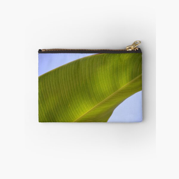 Item preview, Sunlit Green Banana Leaf Against Blue Sky designed and sold by MiraNadaPrints.