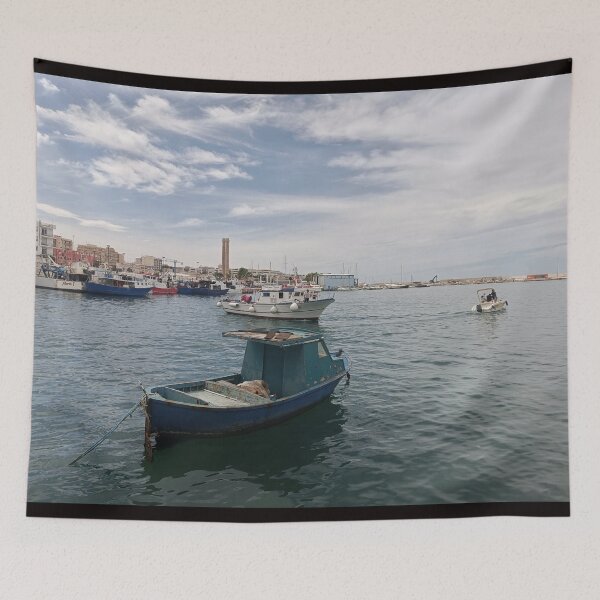 Item preview, Charming Historic Harbor of Monopoli - Rustic Blue Fishing Boat & Town Skyline designed and sold by EpicVistas.