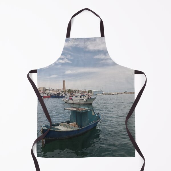 Item preview, Encantador puerto histórico de Monopoli: rústico barco pesquero azul y perfil urbano de la ciudad. designed and sold by EpicVistas.