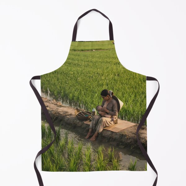 Item preview, Serenity in the Green: Mother's Love at Mekong Delta Rice Fields Art Print, Documentary Rural Photography designed and sold by SOOstudio73.