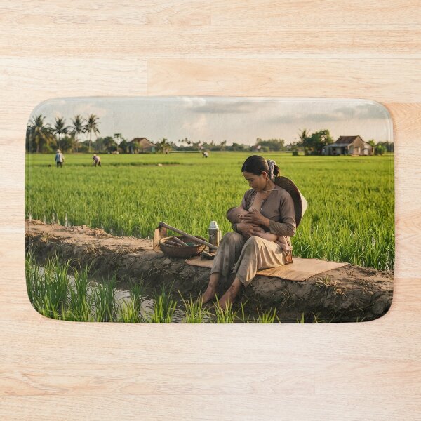 Item preview, Serenity in the Green: Mother's Love at Mekong Delta Rice Fields Art Print, Documentary Rural Photography designed and sold by SOOstudio73.