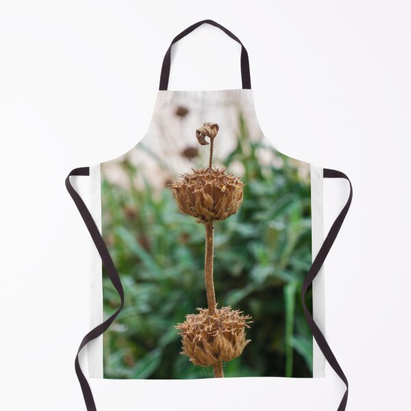 Item preview, Close-Up of a Dry Flower Stem Against a Blurred Green Background designed and sold by Nmallia.