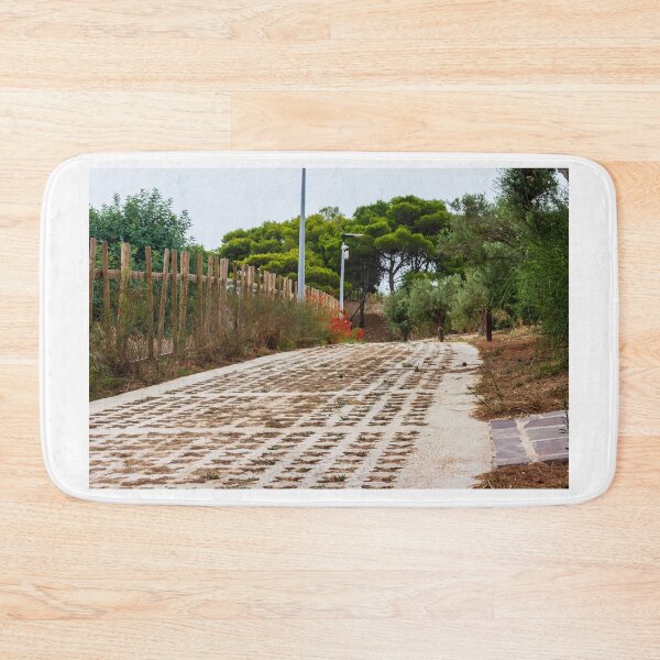 Item preview, Rural Pathway Through Greenery with Wooden Fence and Vegetation designed and sold by Nmallia.