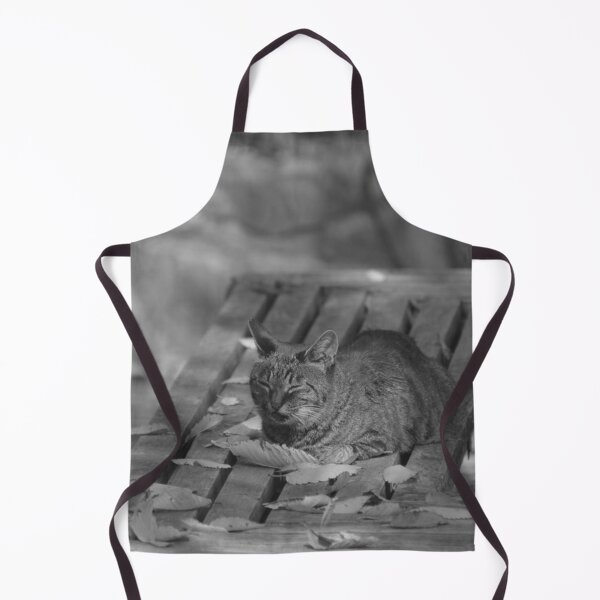 Item preview, Cozy Tabby Cat Napping on Fall Leaf Bench designed and sold by EssaVernice.